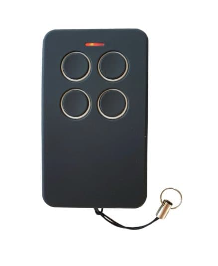 A four-button garage door remote on a keyring